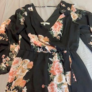 Black romper with flower designs